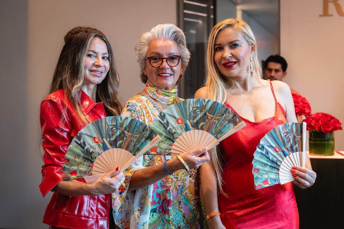 Guests posing at a Miami brand event